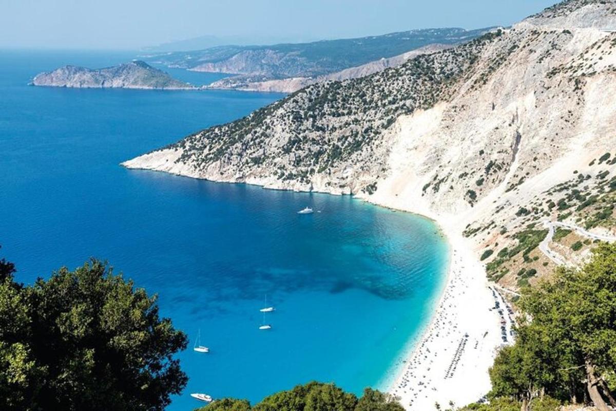 a view of a beach with boats in the water