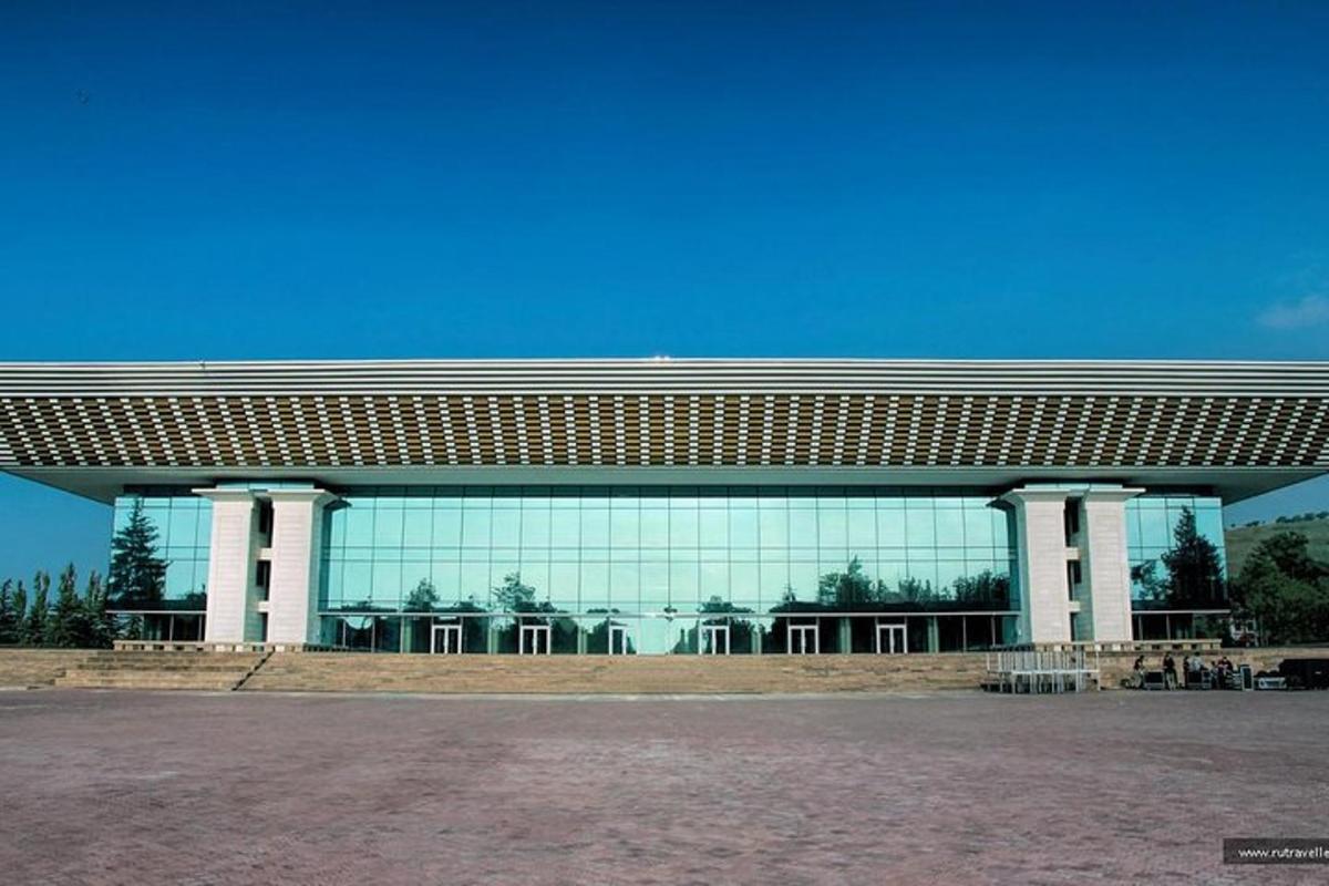 a large building with a large glass facade