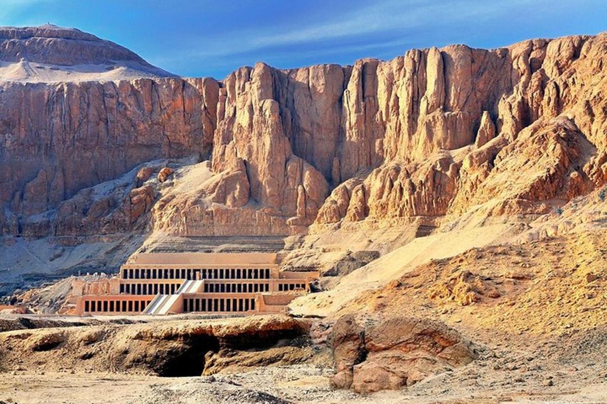 a building in the middle of a desert mountain