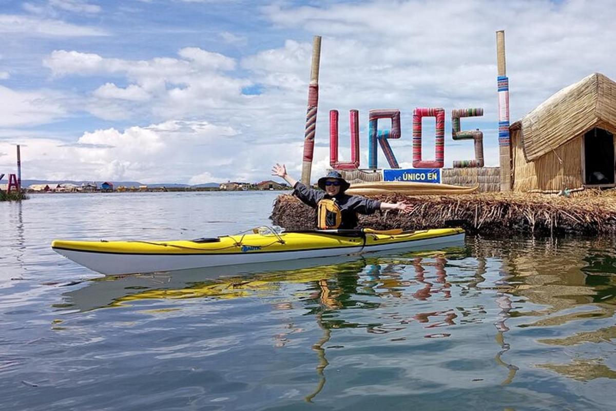 a man in a kayak on a body of water
