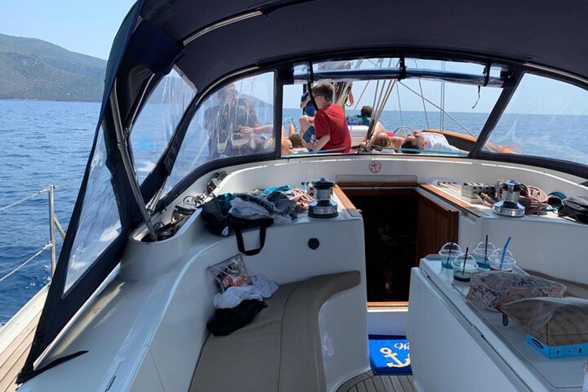 a group of people on a boat in the water