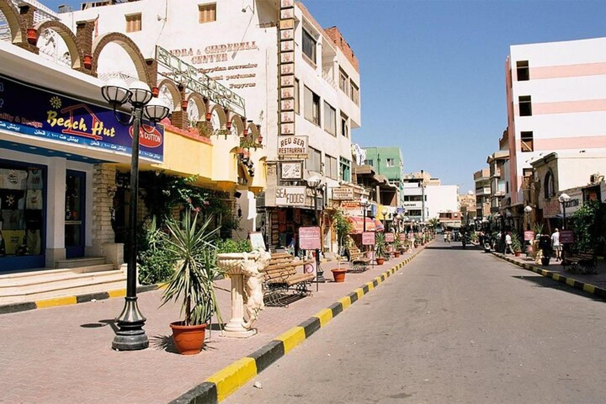 an empty street in a city with buildings