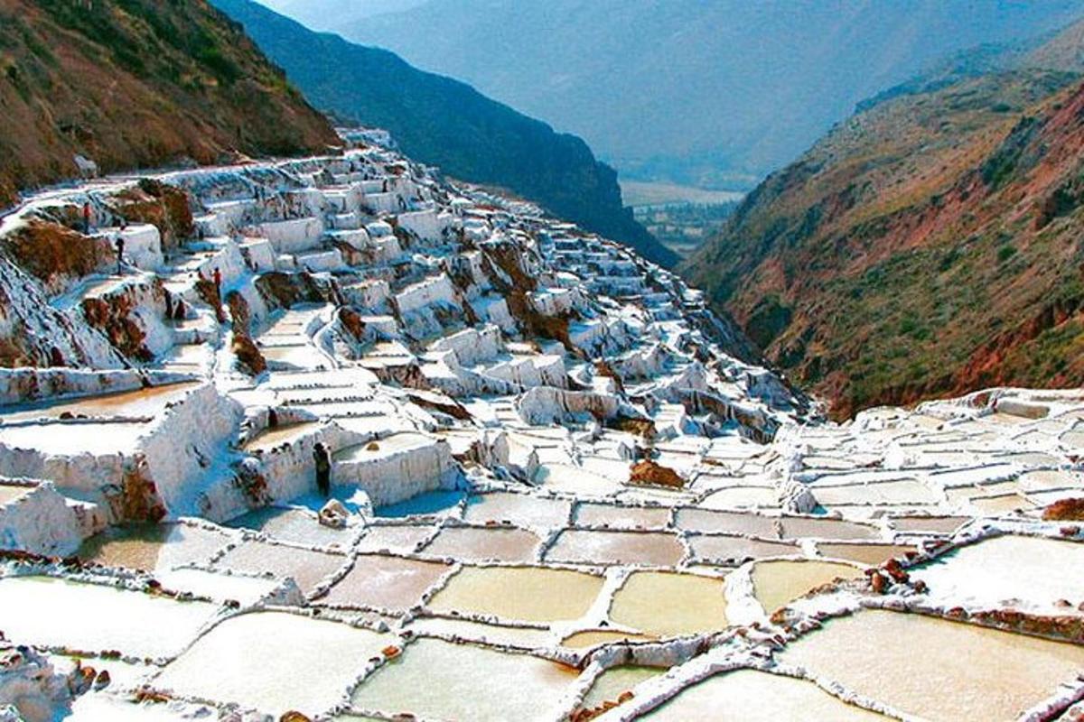 a snow covered village on the side of a mountain