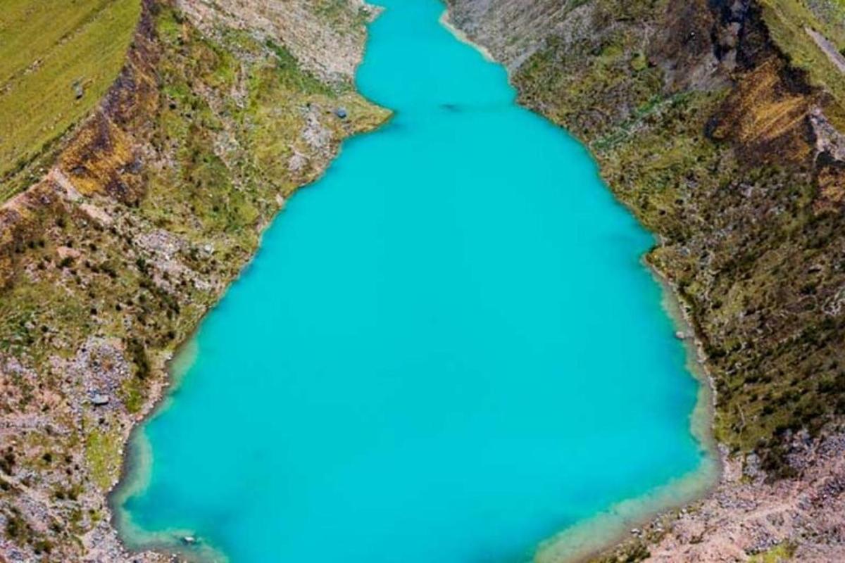 an aerial view of a blue river