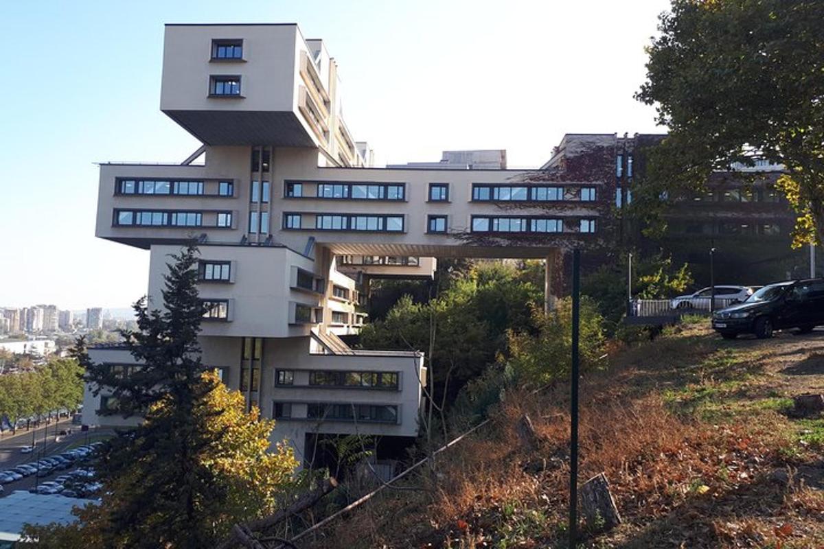 a building on the side of a hill