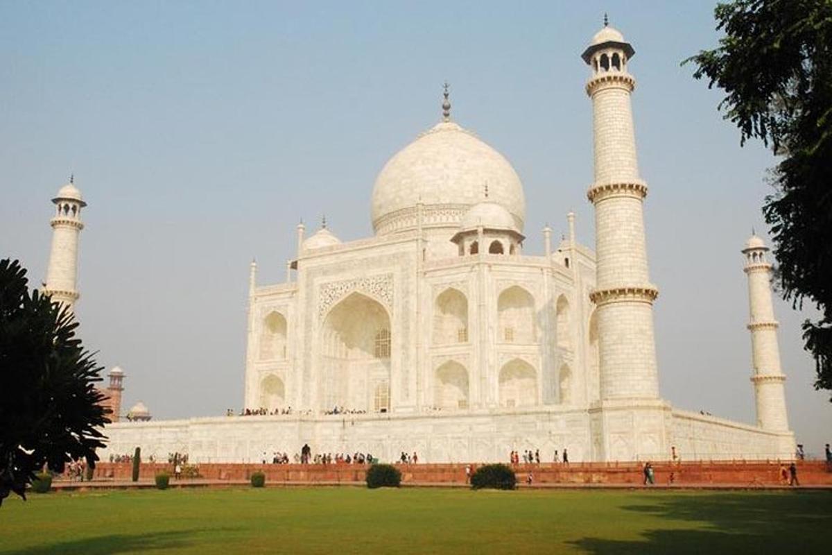 a large white building with two tall towers