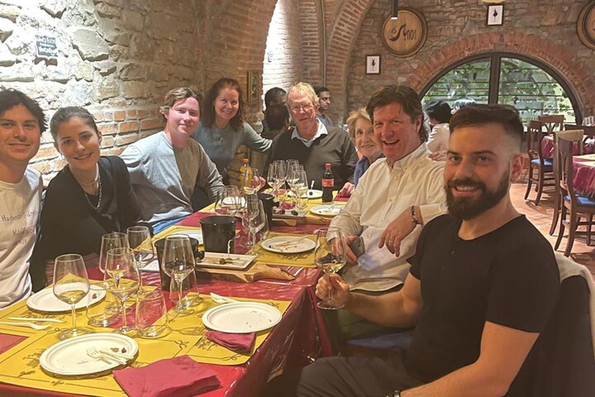 a group of people sitting at a dinner table
