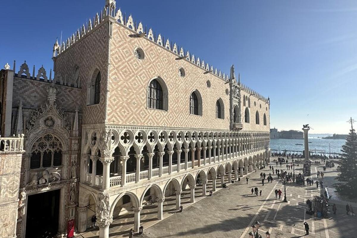 a large building with people walking in front of it