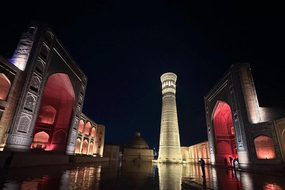 a building with a clock tower at night