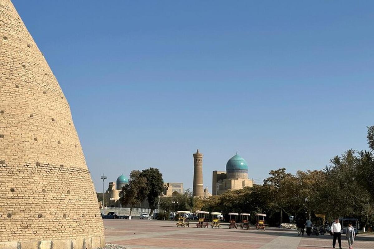 a view of a city with a mosque in the background