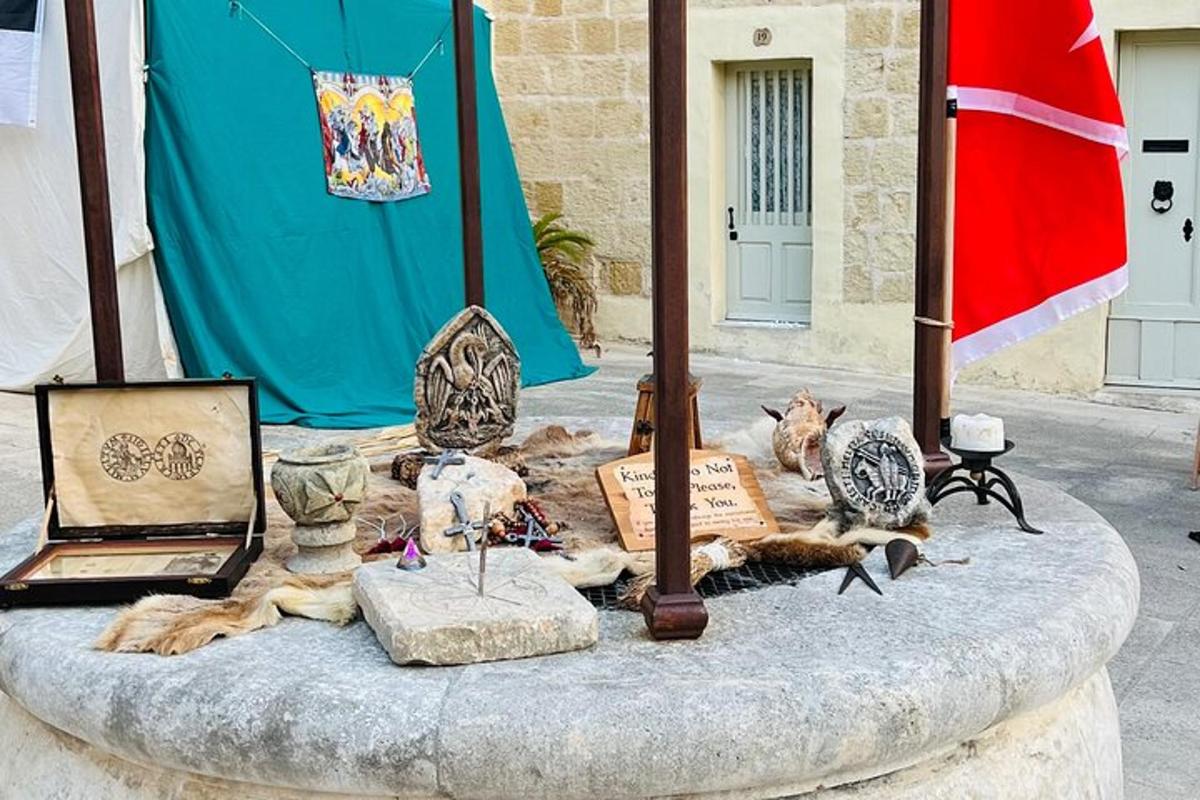 a group of figurines sitting on a table with a flag