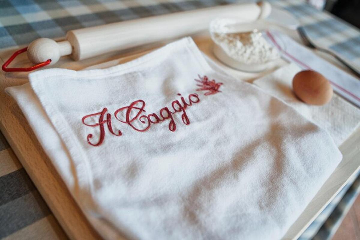 a table with a towel with the word cooking on it