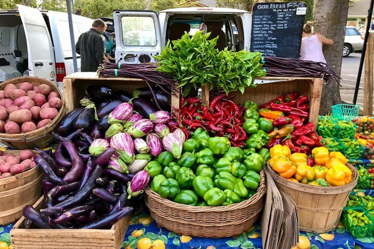 a display of vegetables in baskets at a market