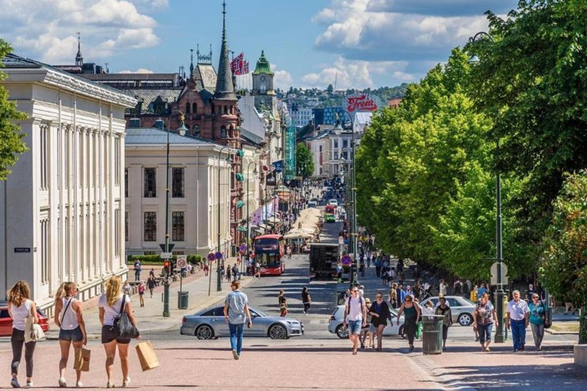 a crowd of people walking down a busy city street