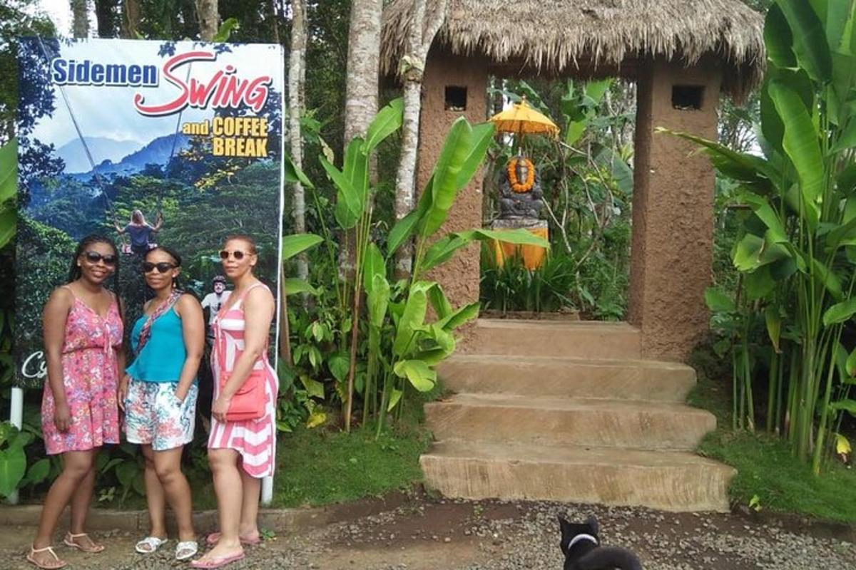 a group of women standing in front of a house