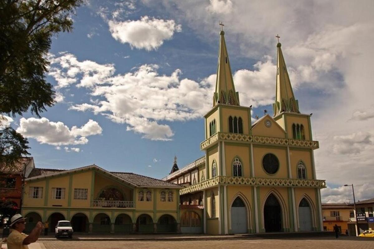 a large building with a church with two towers