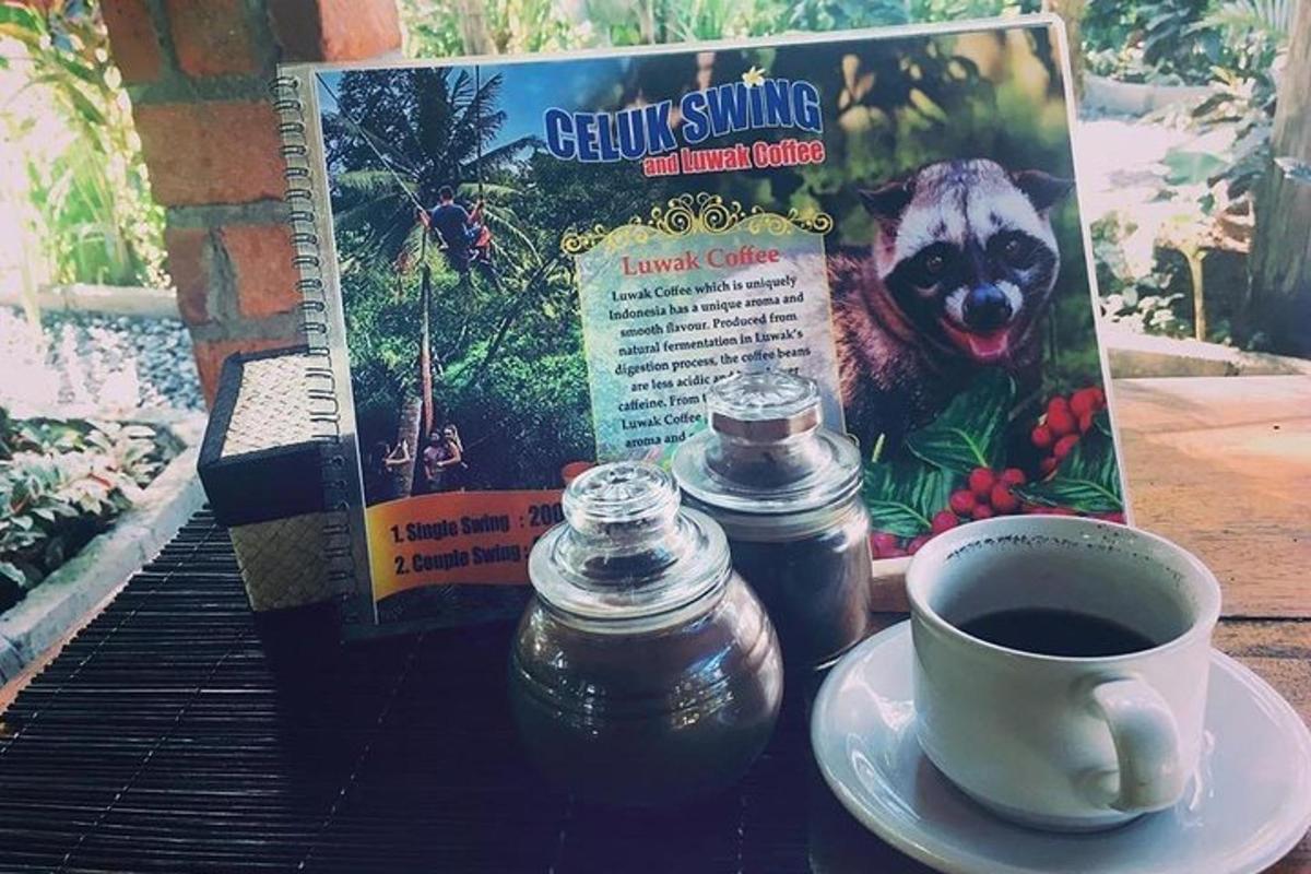 a cup of coffee sitting on a table with a book
