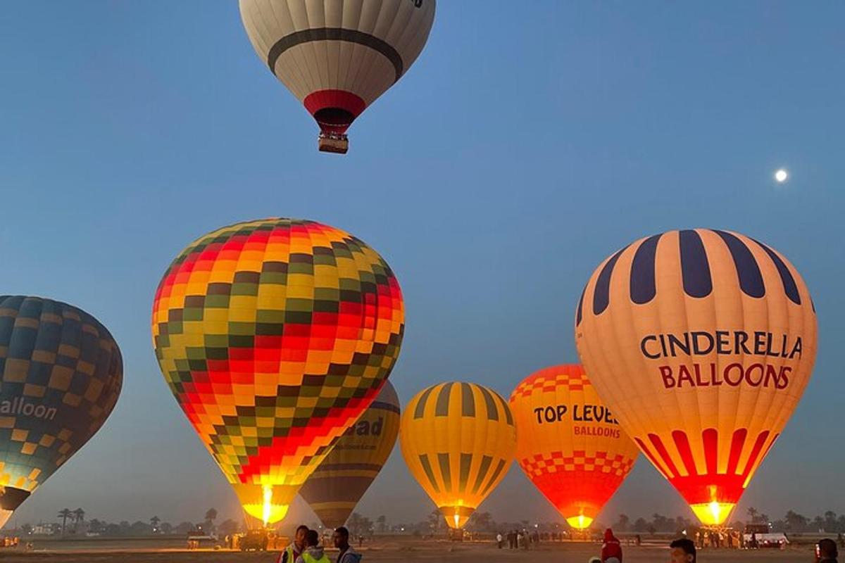 a group of hot air balloons flying in the sky