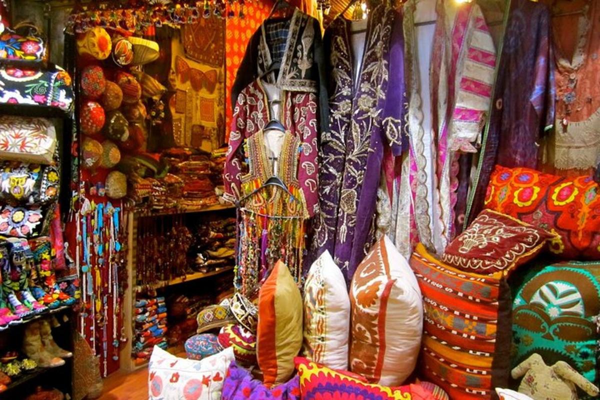 a store filled with lots of different colored fabrics