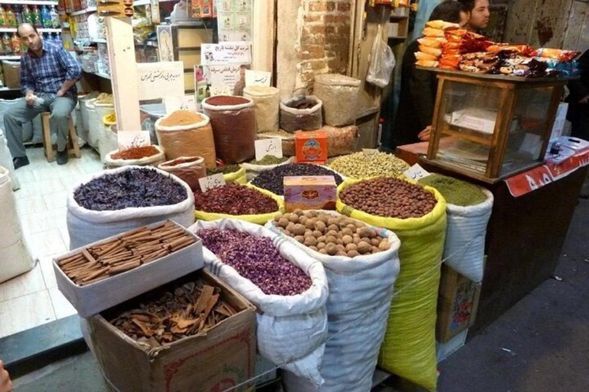 a market with many different types of beans and vegetables