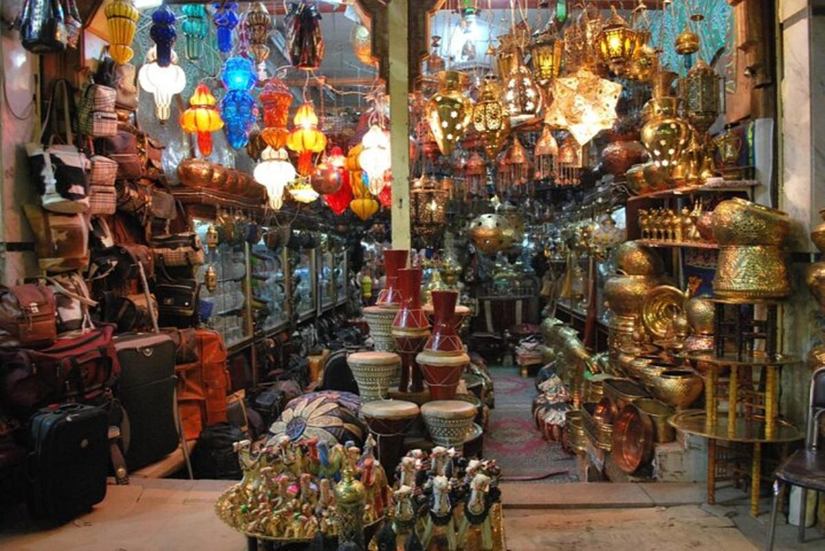 a store filled with lots of lamps and vases
