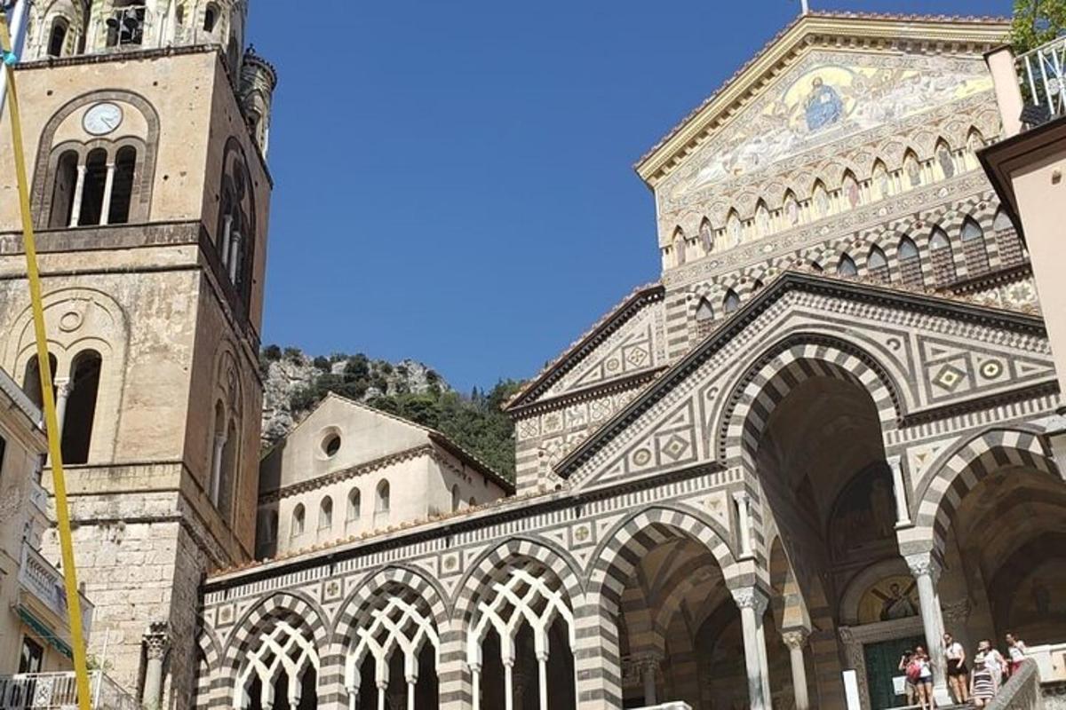 a large stone building with a clock tower