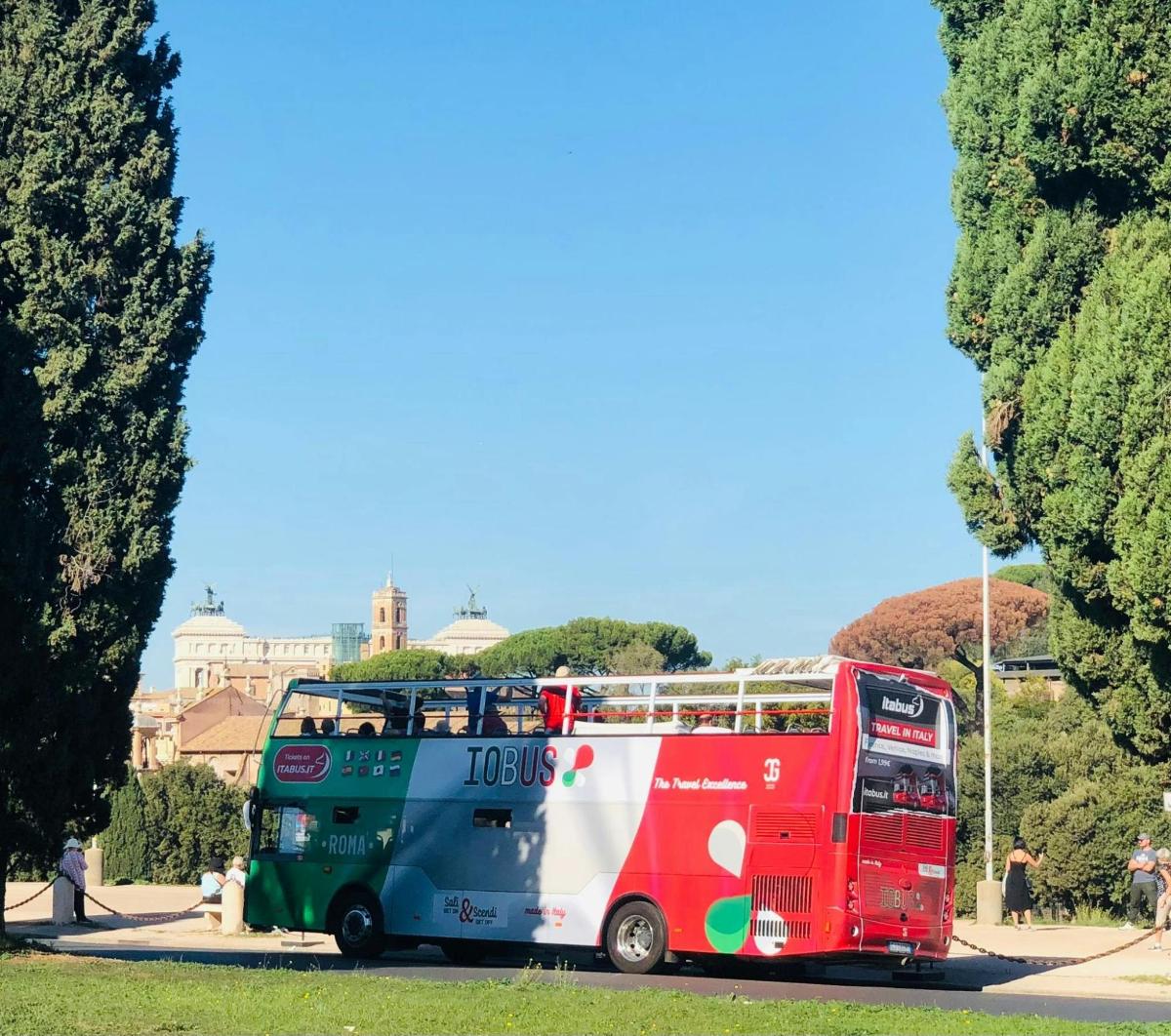 a double decker bus parked in front of a building
