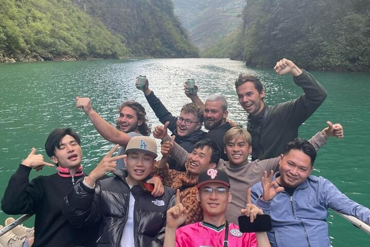a group of people on a boat on a river