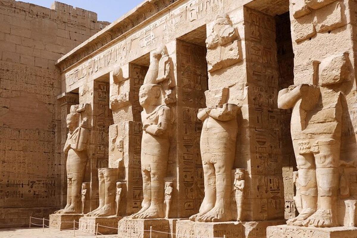 a building with statues on the side of it
