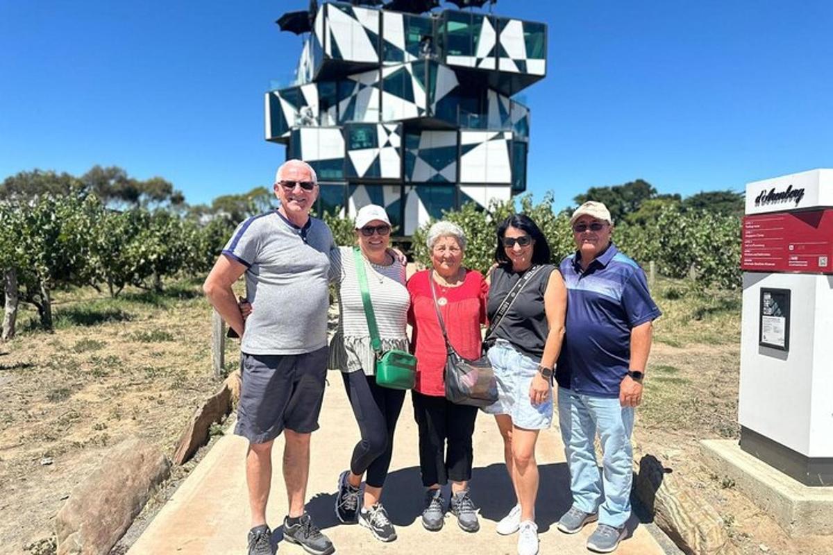 a group of people standing in front of a sign