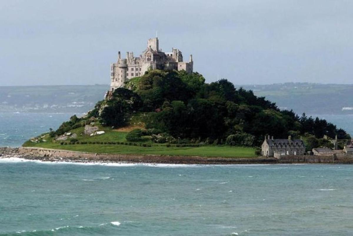 a castle on top of an island in the ocean