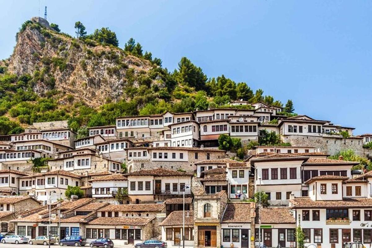 a group of houses on top of a mountain