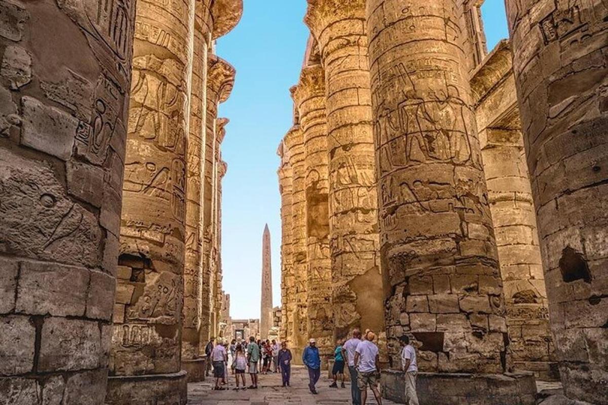 a group of people walking through an old building