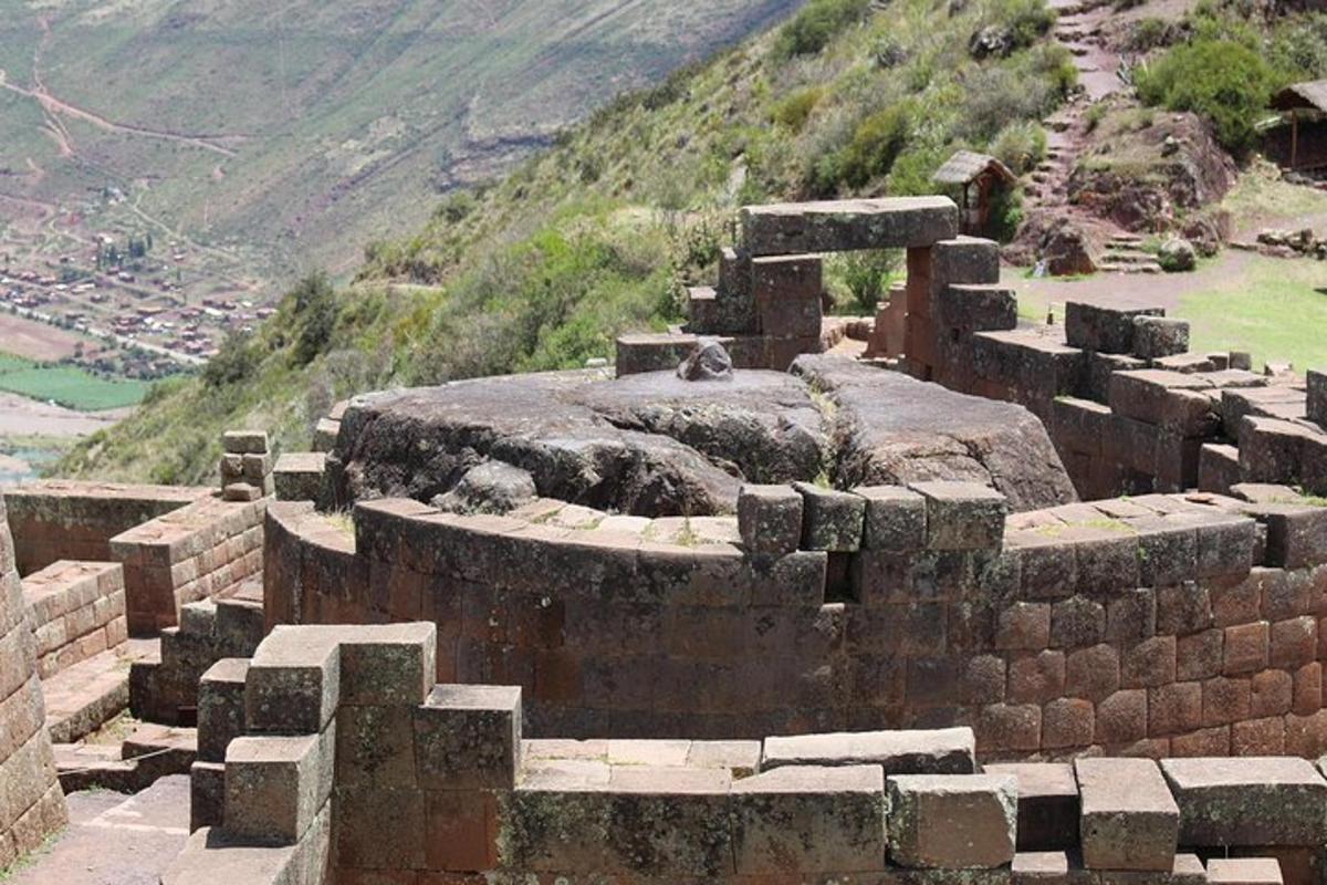 an old building on the side of a mountain