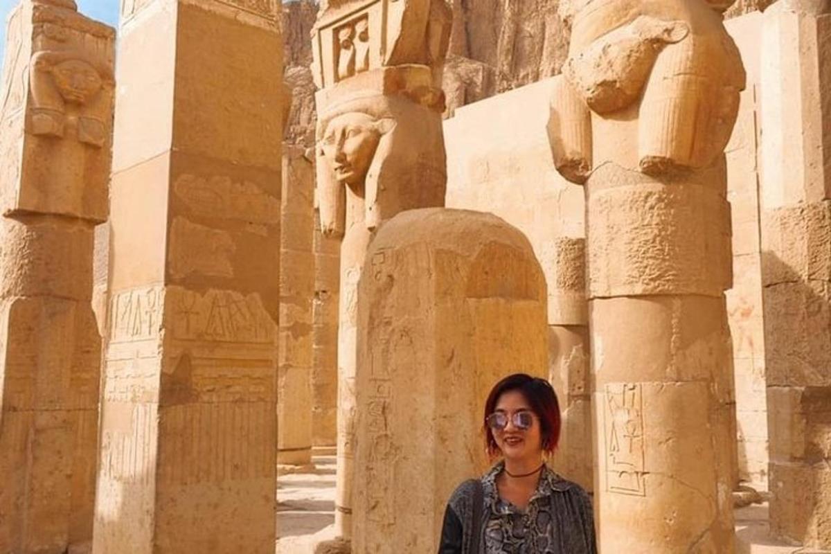 a woman standing in front of a building