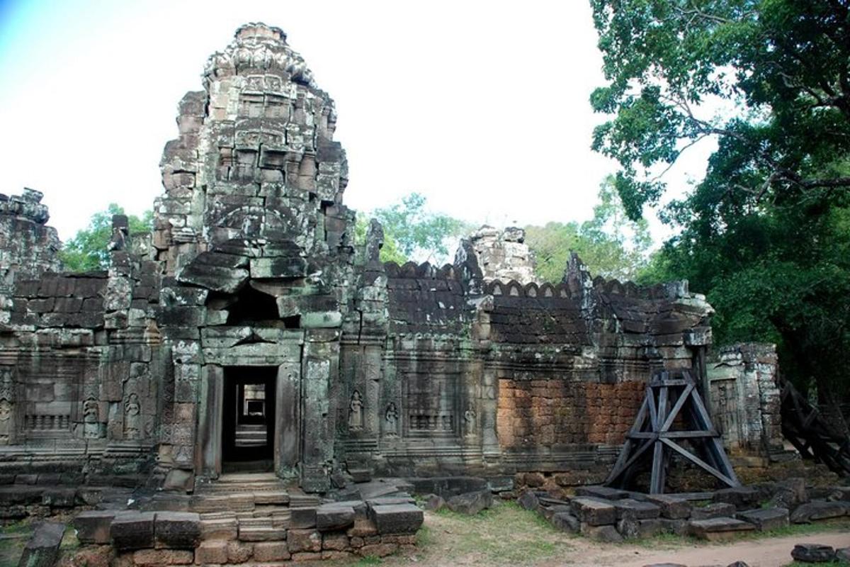 an old stone building with a doorway in front