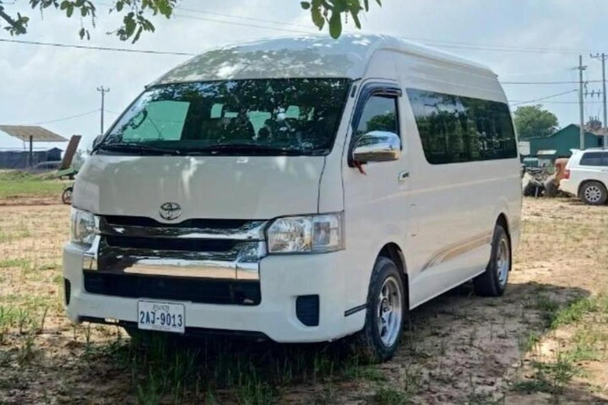 a white van is parked in a field