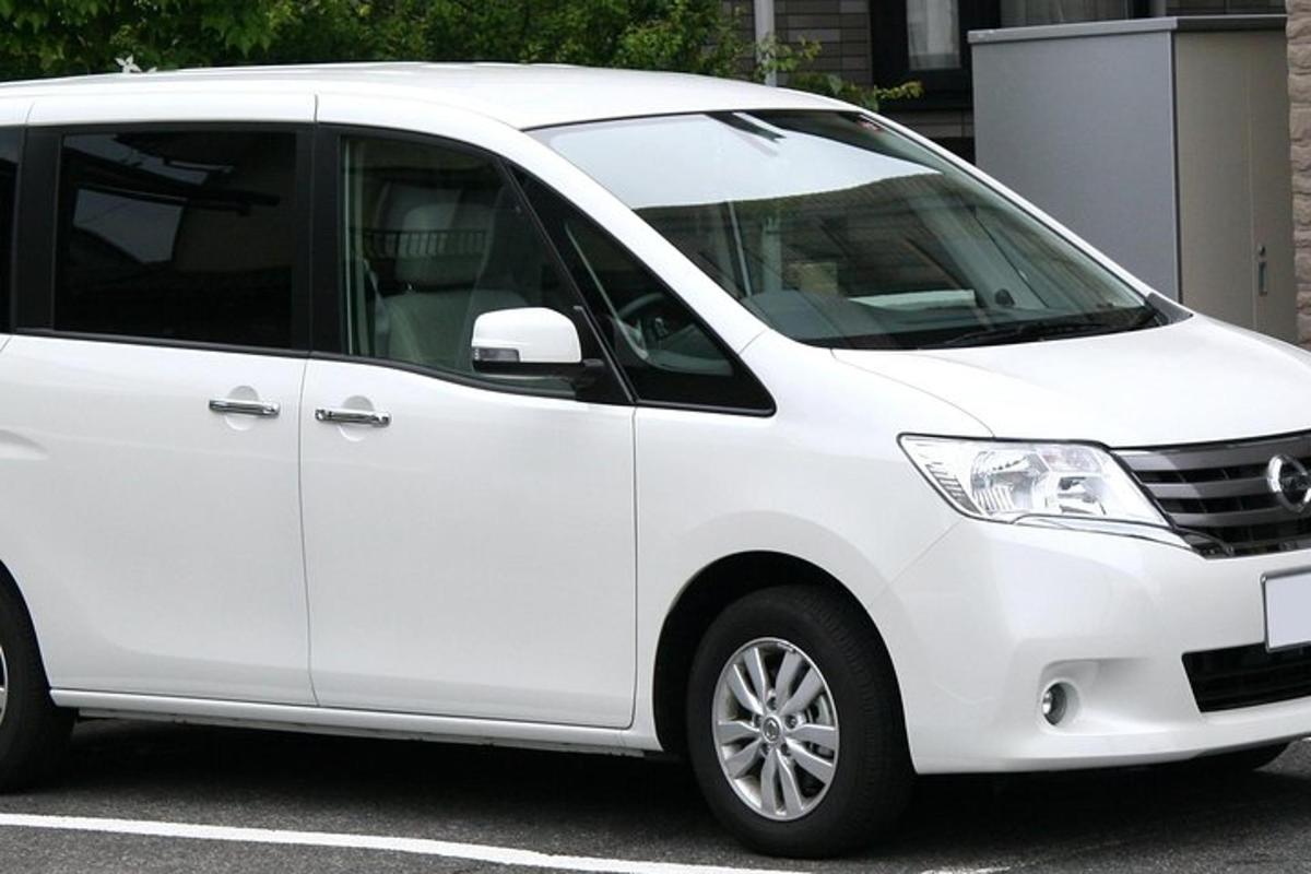 a white van parked in a parking lot
