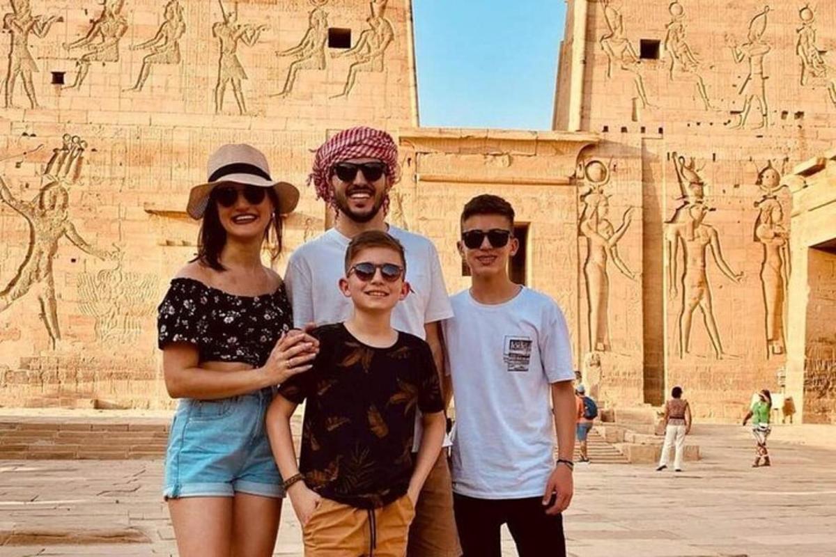 a group of people standing in front of a building