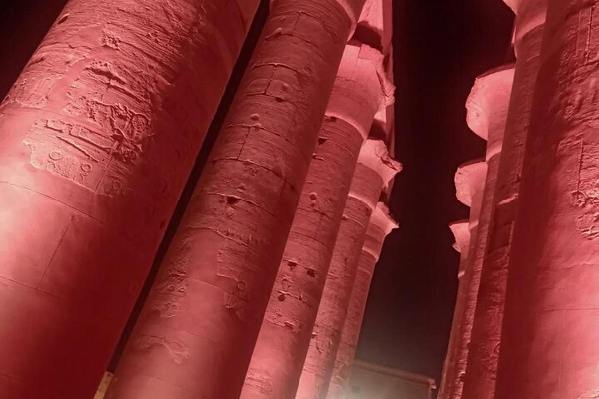 a group of red columns in a building