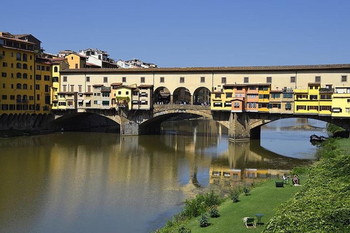 a bridge over a body of water with buildings