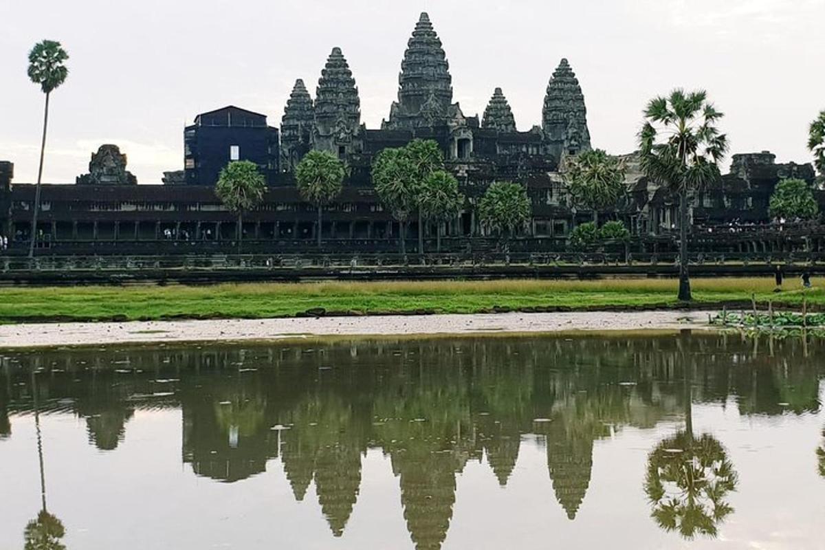 a view of a temple with a reflection in a body of water
