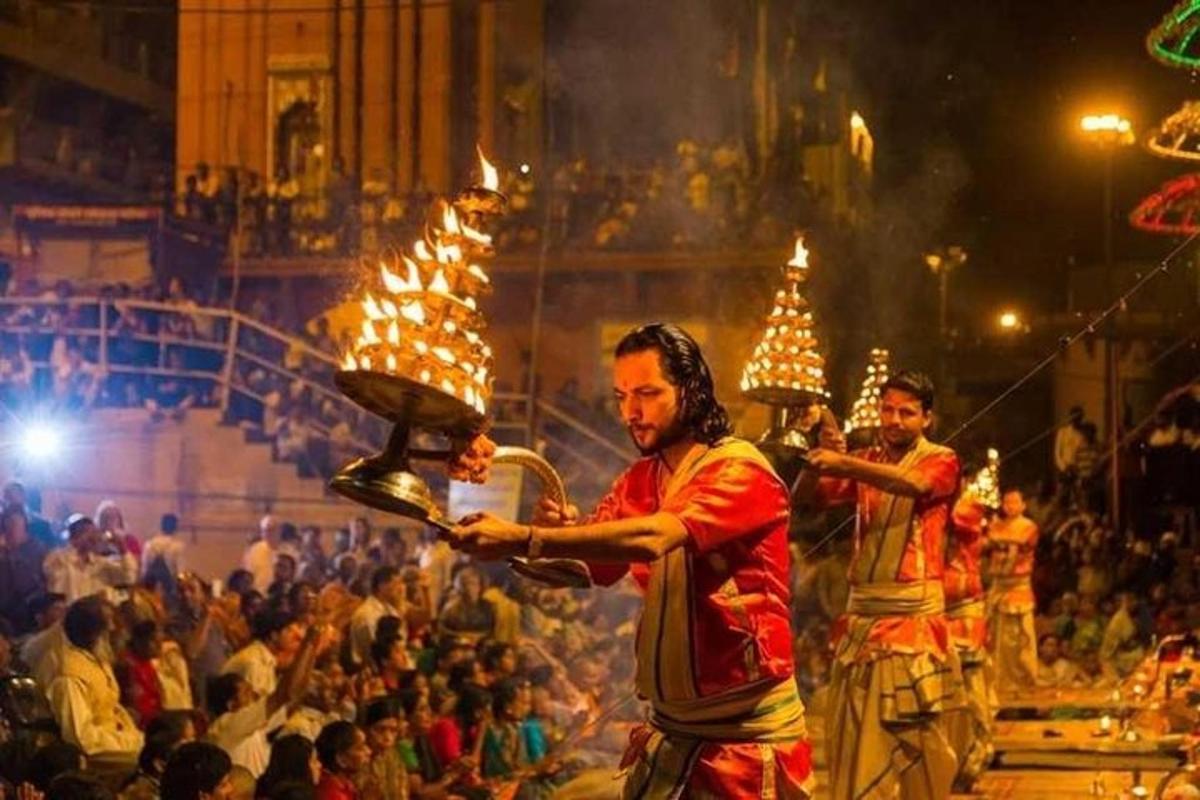 a group of men performing a show in a crowd