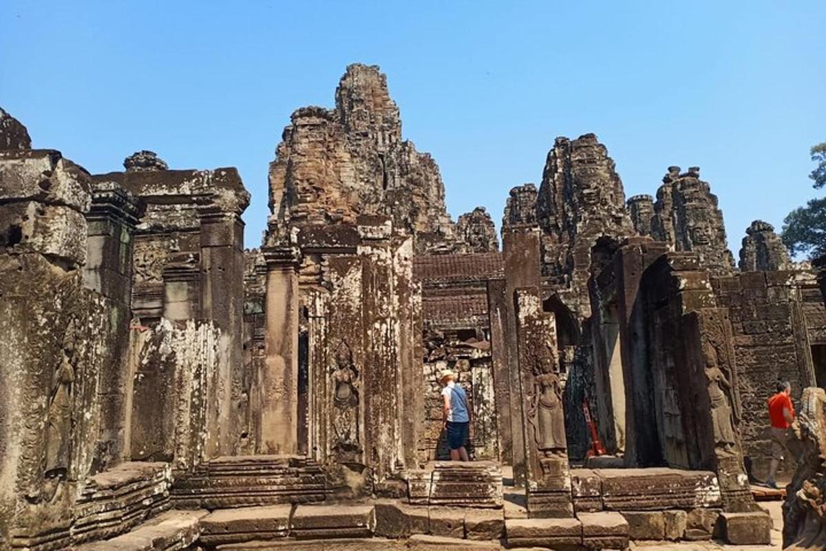 a man standing in front of a temple