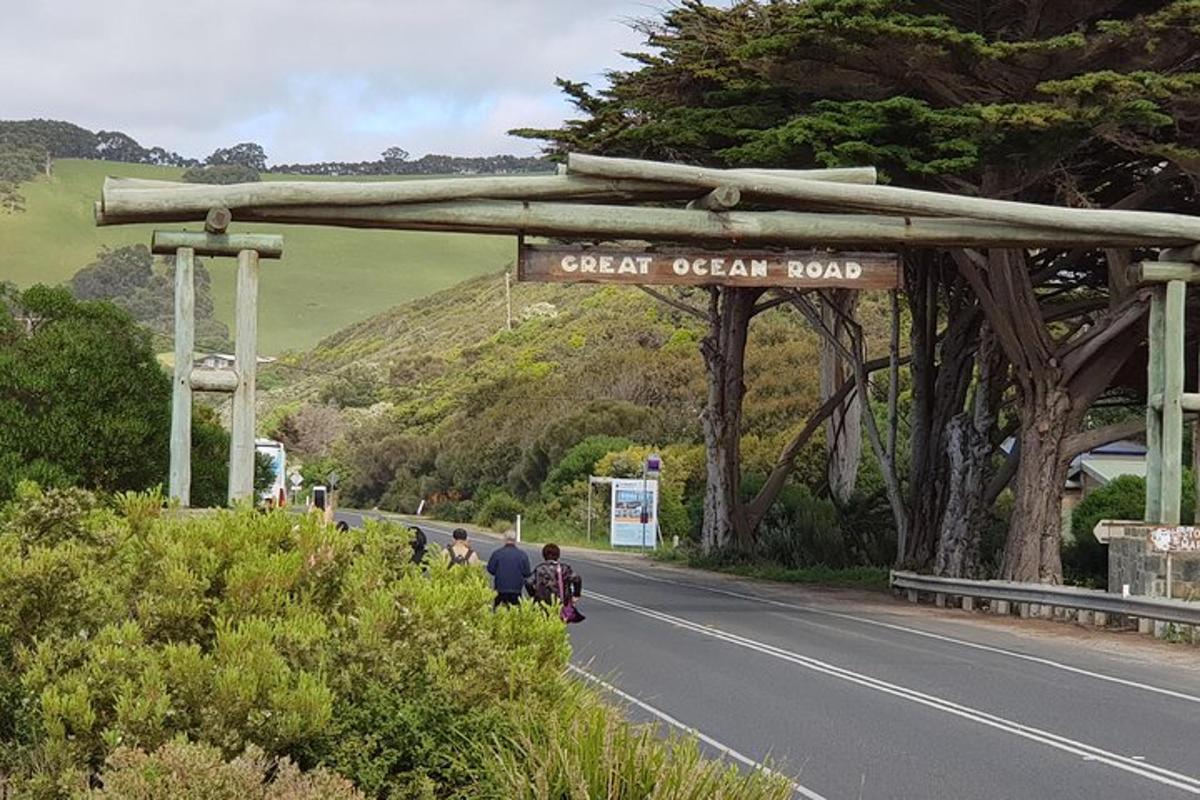a road with a sign that reads great ocean road