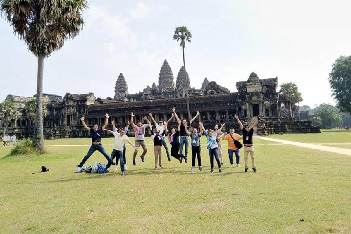 a group of people jumping in front of a building
