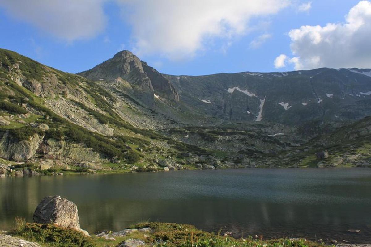a view of a mountain range with a lake