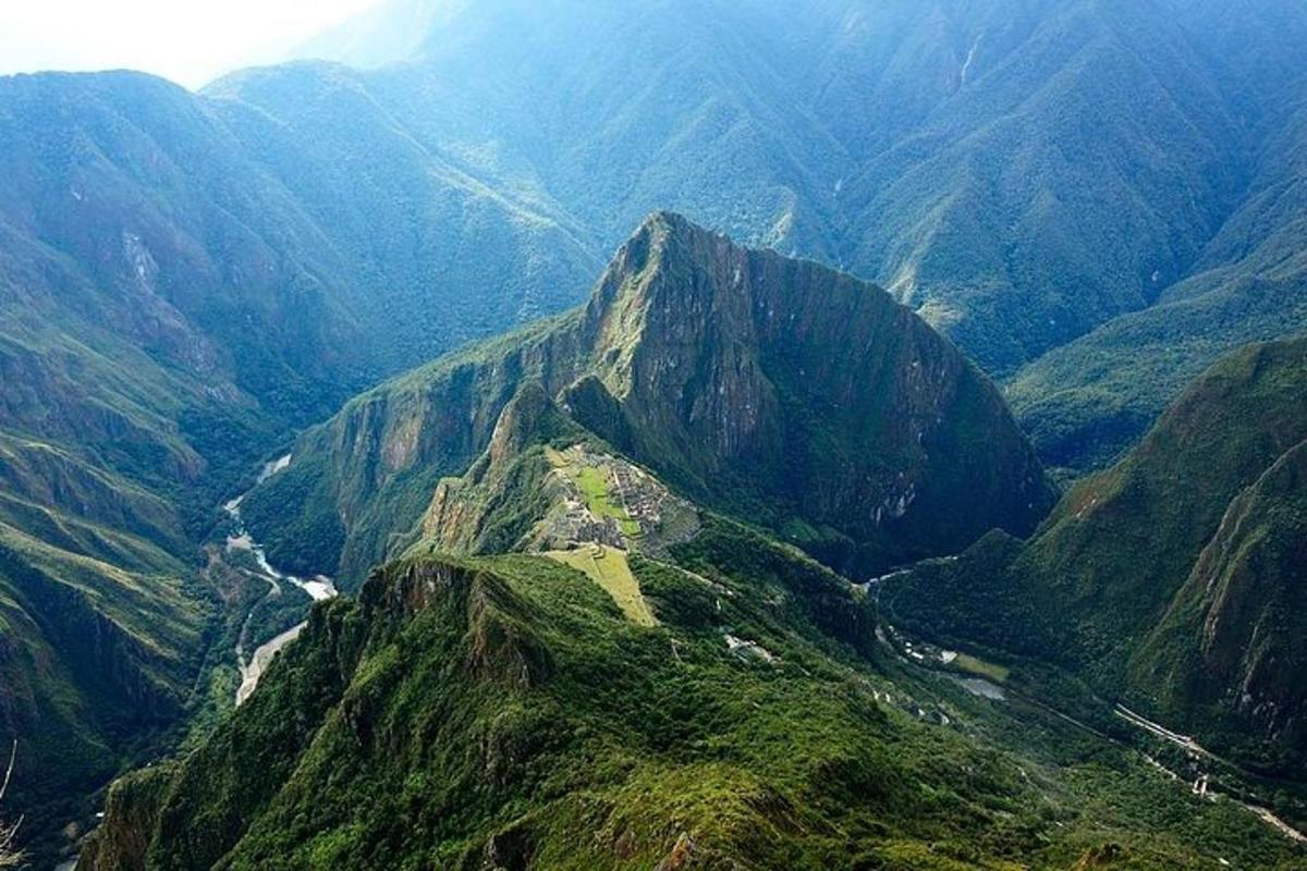 a view of a mountain with a road on it
