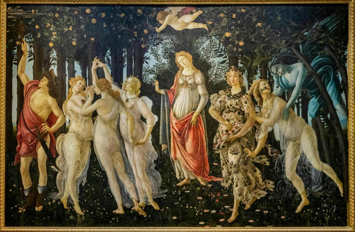 una pintura d'un grup de persones en una paret