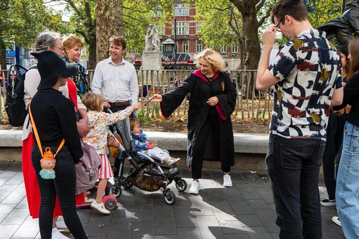 a woman with a child in a stroller and a crowd of people